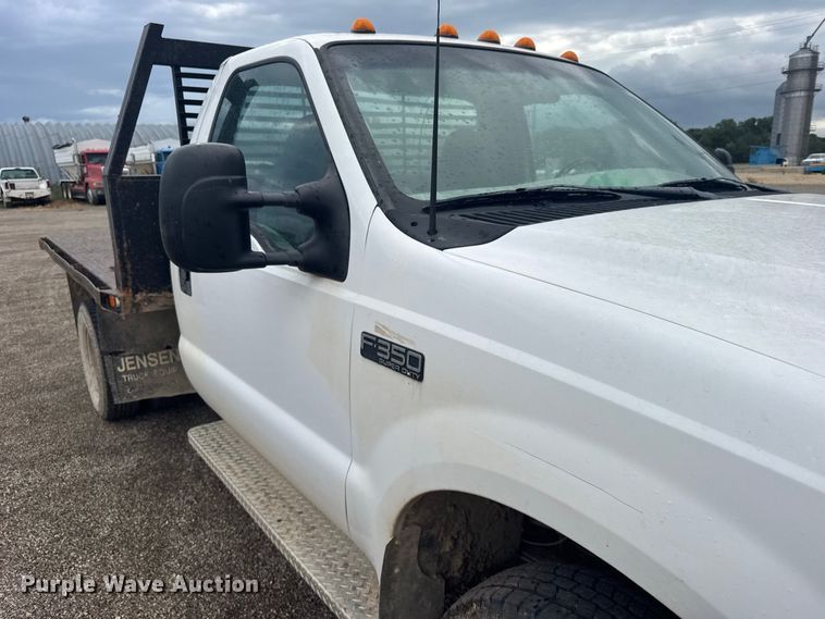 image for item DY3227 1999 Ford F350 flatbed pickup truck
