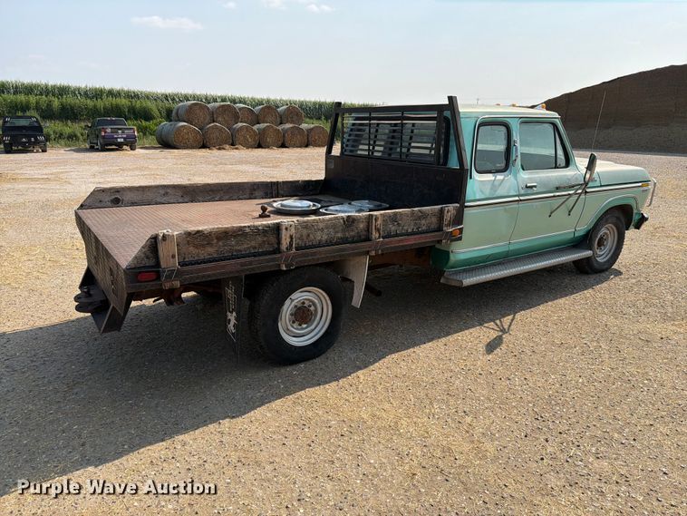 image for item ER1899 1977 Ford F250 Ranger Camper Special flatbed pickup truck