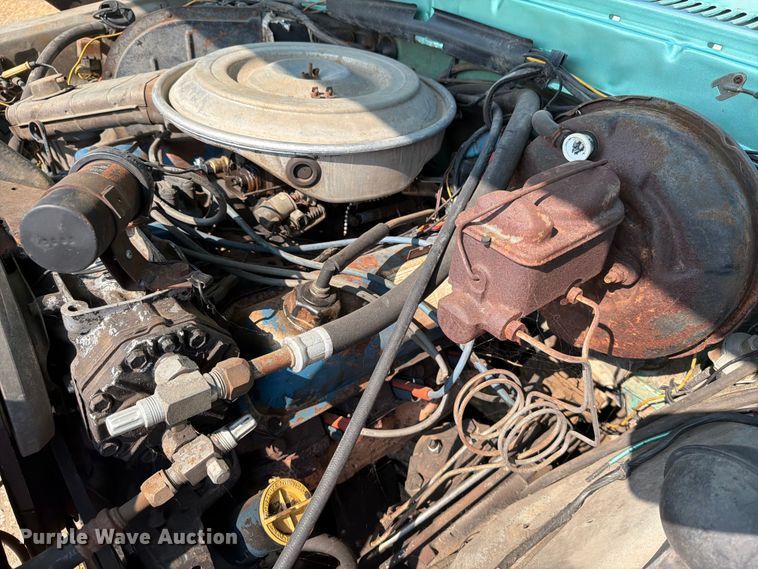 image for item ER1899 1977 Ford F250 Ranger Camper Special flatbed pickup truck