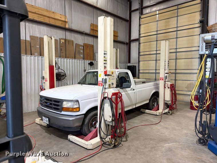 2003 Sterile Komi ST-1072 four post lift