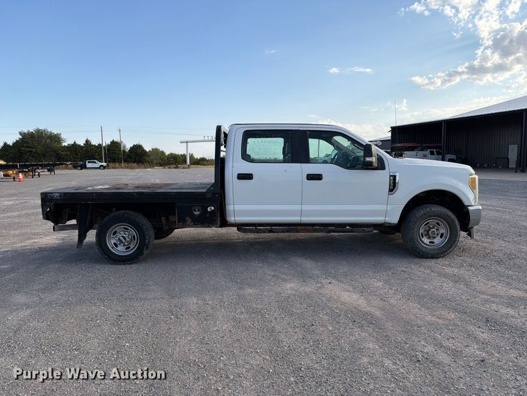 image for item EW8706 2017 Ford F250 Super Duty Crew Cab flatbed pickup truck