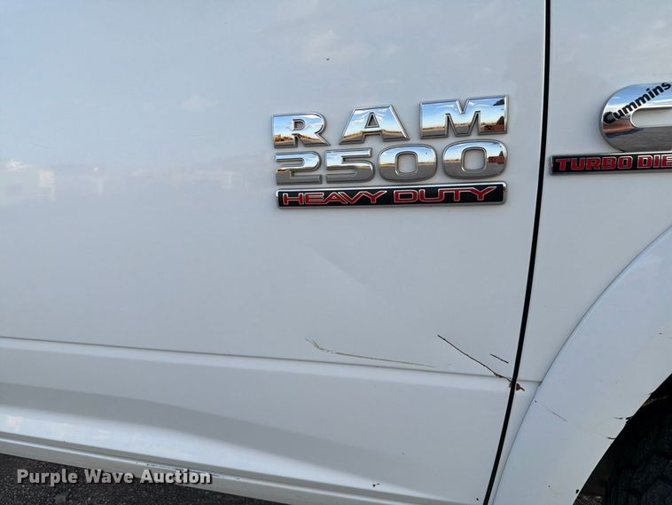 image for item EW8707 2017 RAM 2500 Crew Cab flatbed pickup truck