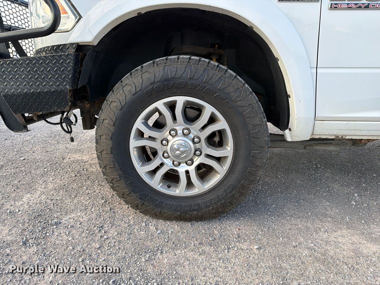 image for item EW8707 2017 RAM 2500 Crew Cab flatbed pickup truck