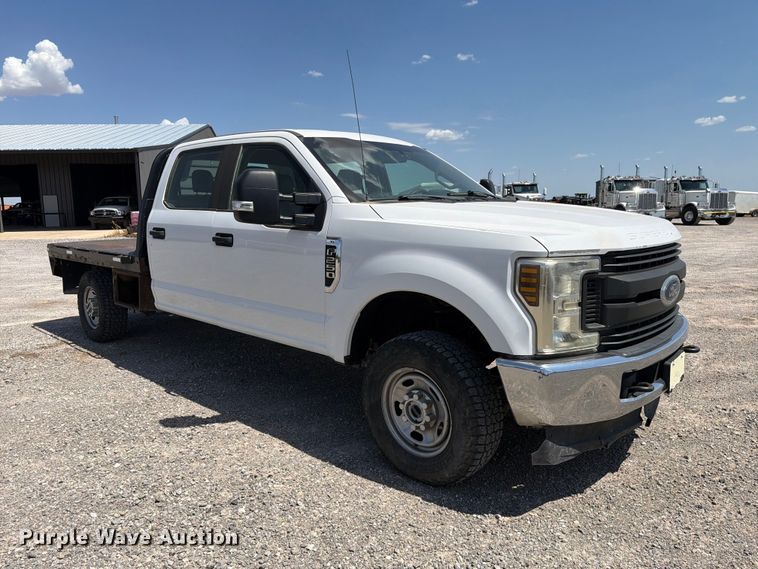 image for item EW8708 2019 Ford F250 Super Duty Crew Cab flatbed pickup truck