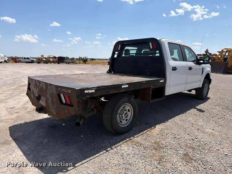 image for item EW8708 2019 Ford F250 Super Duty Crew Cab flatbed pickup truck