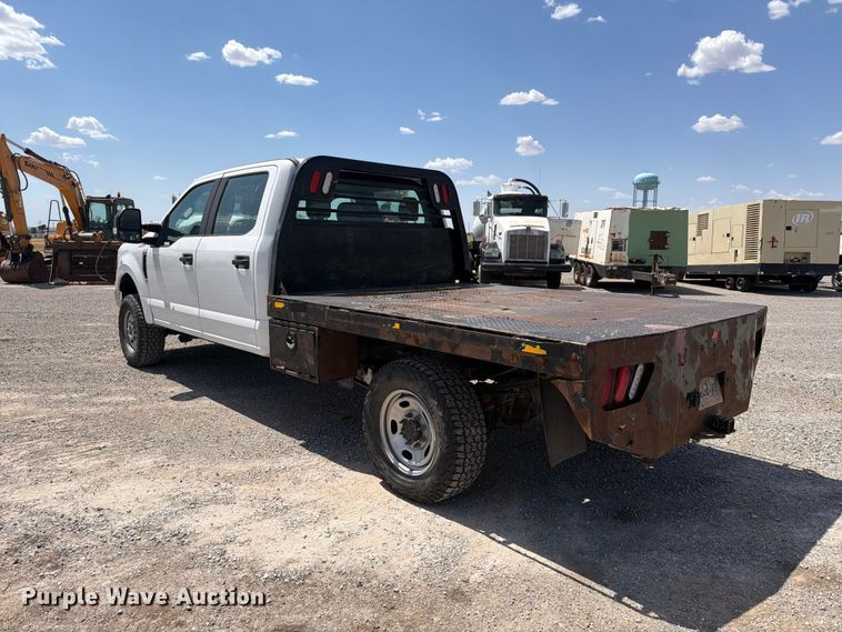 image for item EW8708 2019 Ford F250 Super Duty Crew Cab flatbed pickup truck