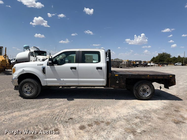 image for item EW8708 2019 Ford F250 Super Duty Crew Cab flatbed pickup truck