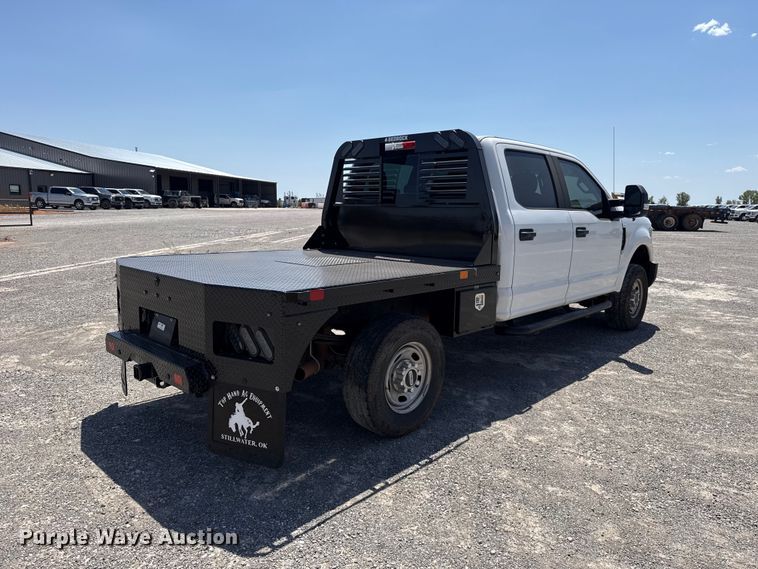 image for item EW8710 2017 Ford F250 Super Duty Crew Cab flatbed pickup truck