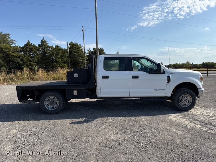 image for item EW8714 2021 Ford F-250 Crew Cab flatbed truck