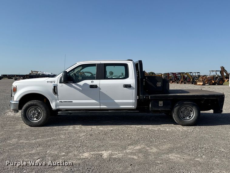 image for item EW8714 2021 Ford F-250 Crew Cab flatbed truck