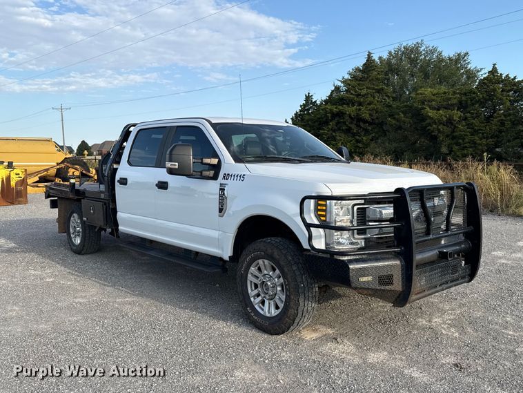 image for item EW8715 2019 Ford F250 Super Duty Crew Cab flatbed pickup truck