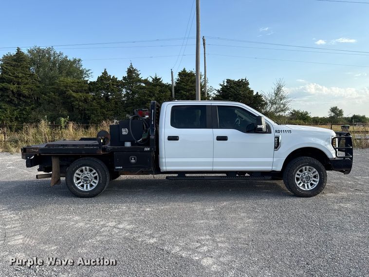 image for item EW8715 2019 Ford F250 Super Duty Crew Cab flatbed pickup truck