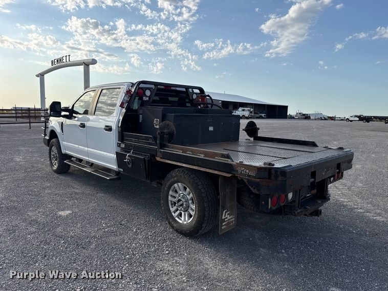 image for item EW8715 2019 Ford F250 Super Duty Crew Cab flatbed pickup truck