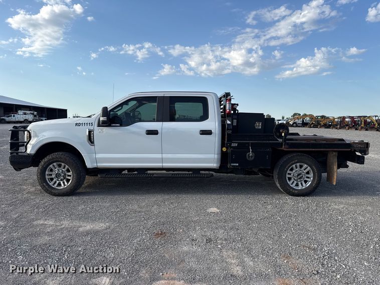 image for item EW8715 2019 Ford F250 Super Duty Crew Cab flatbed pickup truck