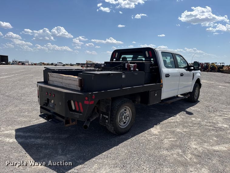 image for item EW8722 2017 Ford F250 Super Duty Crew Cab flatbed pickup truck