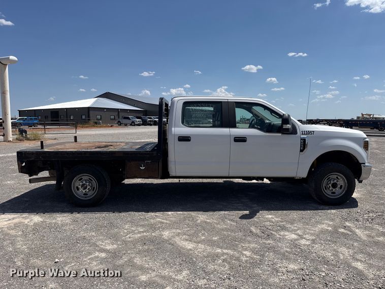 image for item EW8723 2019 Ford F250 Super Duty Crew Cab flatbed pickup truck