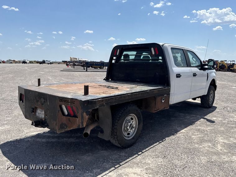 image for item EW8723 2019 Ford F250 Super Duty Crew Cab flatbed pickup truck