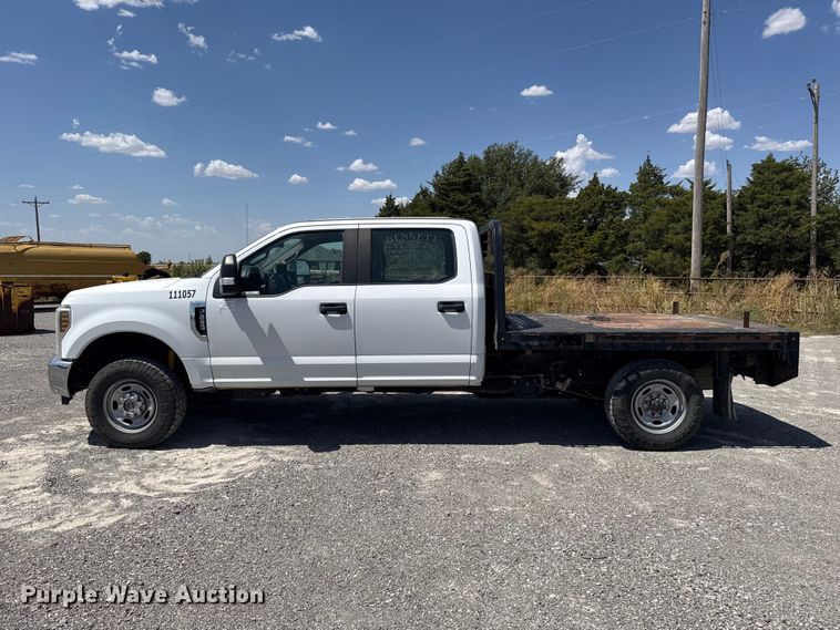 image for item EW8723 2019 Ford F250 Super Duty Crew Cab flatbed pickup truck