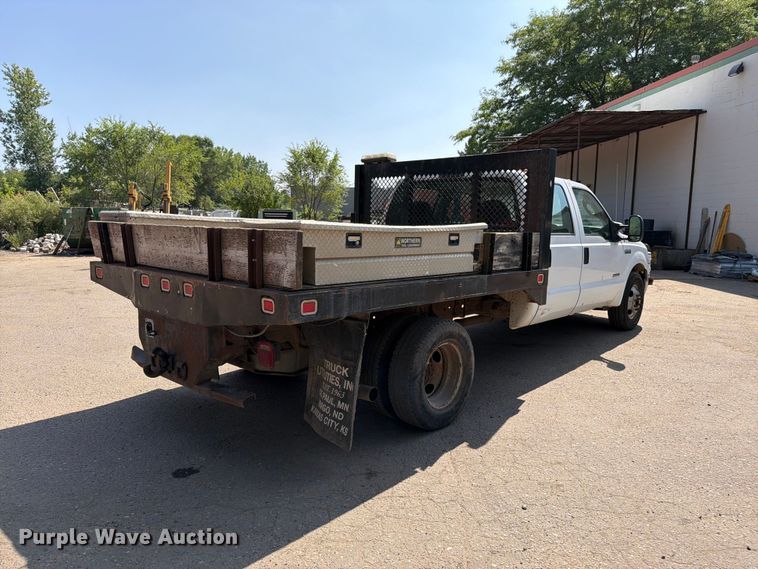 image for item FK3377 2005 Ford F350 Super Duty Crew Cab flatbed pickup truck