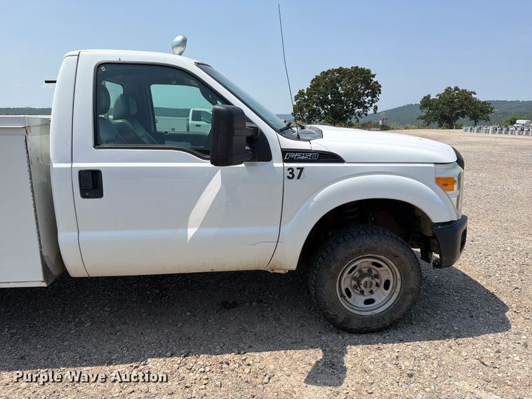 image for item FK5041 2011 Ford F250 Super Duty utility bed pickup truck