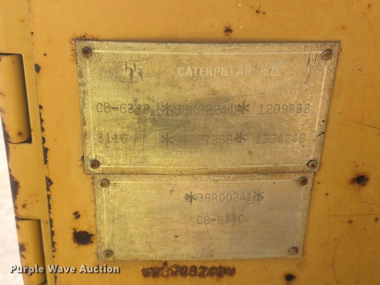 image for item EA0467 1998 Caterpillar CB-634C double drum vibratory roller