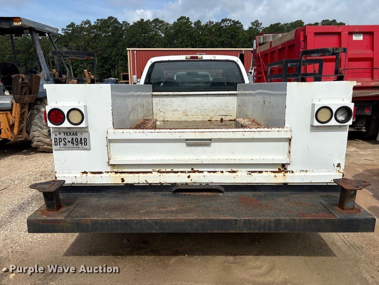image for item EU0688 2006 Ford F350 Super Duty Crew Cab utility bed pickup truck