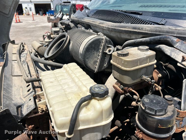 image for item FT6085 2007 GMC C5500 Crew Cab dump flatbed truck