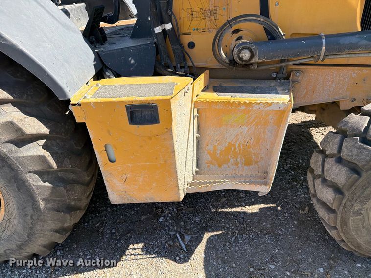 image for item YA4677 2020 John Deere 210L landscape tractor
