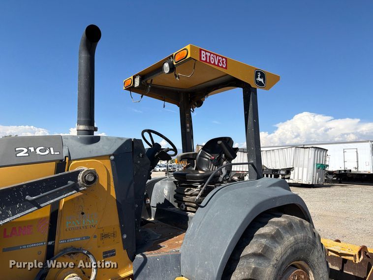 image for item YA4677 2020 John Deere 210L landscape tractor