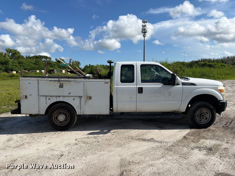image for item DV7326 2015 Ford F250 Super Duty Ext. Cab utility bed pickup truck
