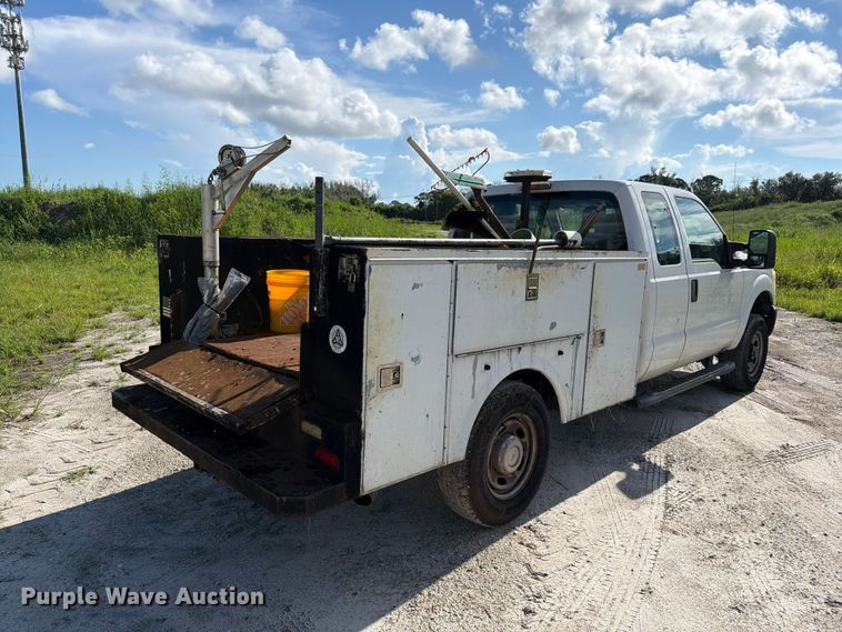 image for item DV7326 2015 Ford F250 Super Duty Ext. Cab utility bed pickup truck
