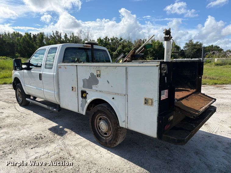 image for item DV7326 2015 Ford F250 Super Duty Ext. Cab utility bed pickup truck