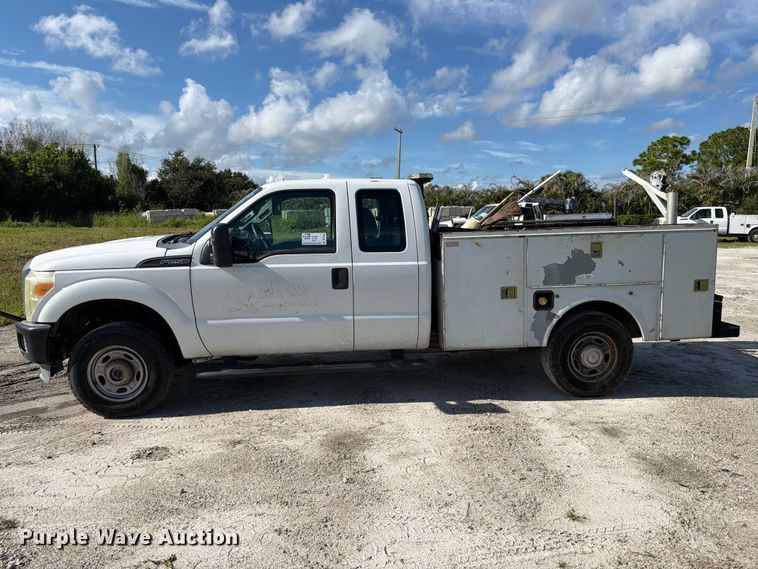 image for item DV7326 2015 Ford F250 Super Duty Ext. Cab utility bed pickup truck