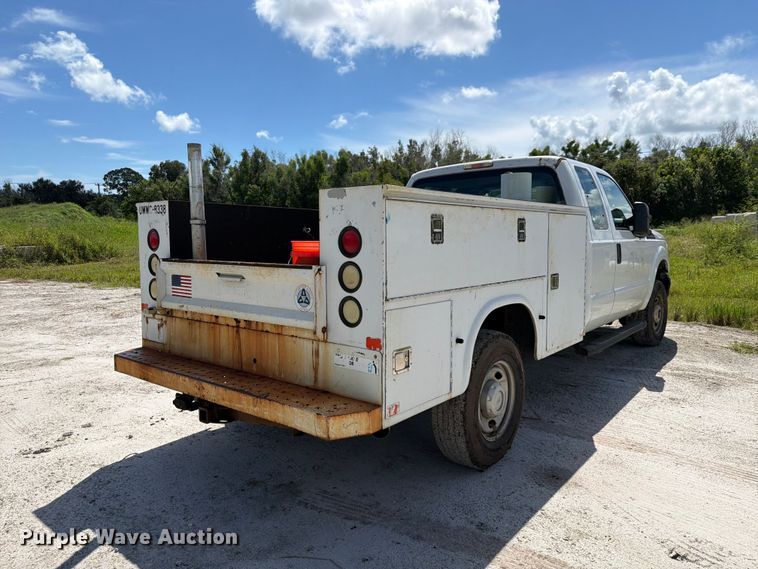 image for item DV7330 2015 Ford F250 Super Duty Ext. Cab utility bed pickup truck