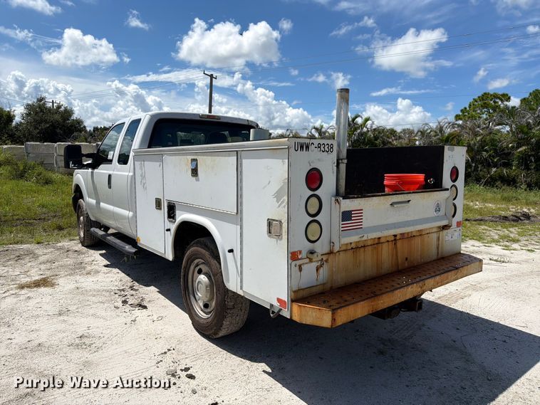image for item DV7330 2015 Ford F250 Super Duty Ext. Cab utility bed pickup truck