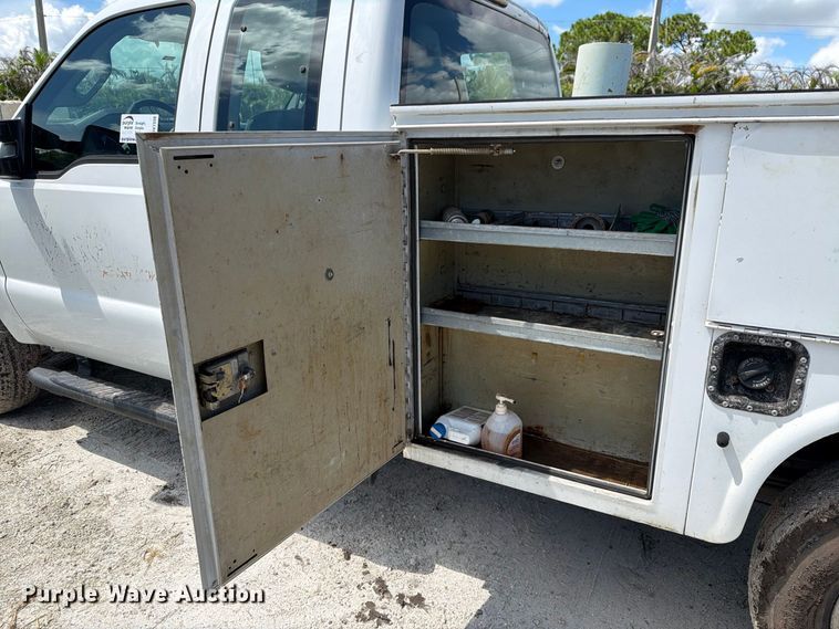 image for item DV7330 2015 Ford F250 Super Duty Ext. Cab utility bed pickup truck