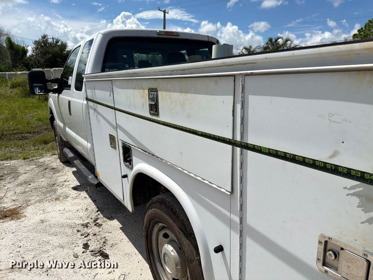 image for item DV7330 2015 Ford F250 Super Duty Ext. Cab utility bed pickup truck