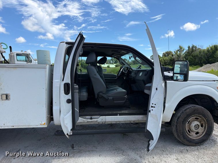 image for item DV7330 2015 Ford F250 Super Duty Ext. Cab utility bed pickup truck