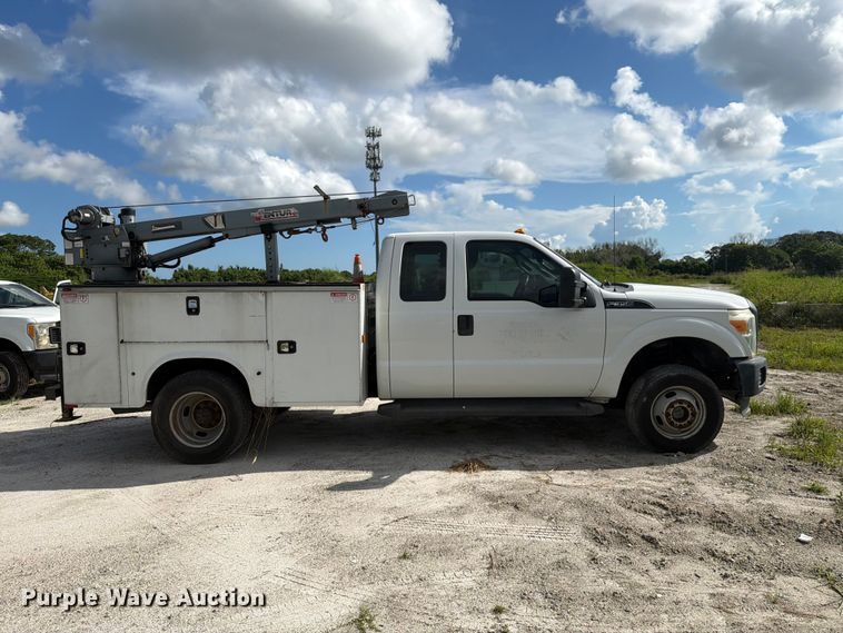 image for item DV7333 2015 Ford F350 Super Duty Ext. Cab utility bed pickup truck