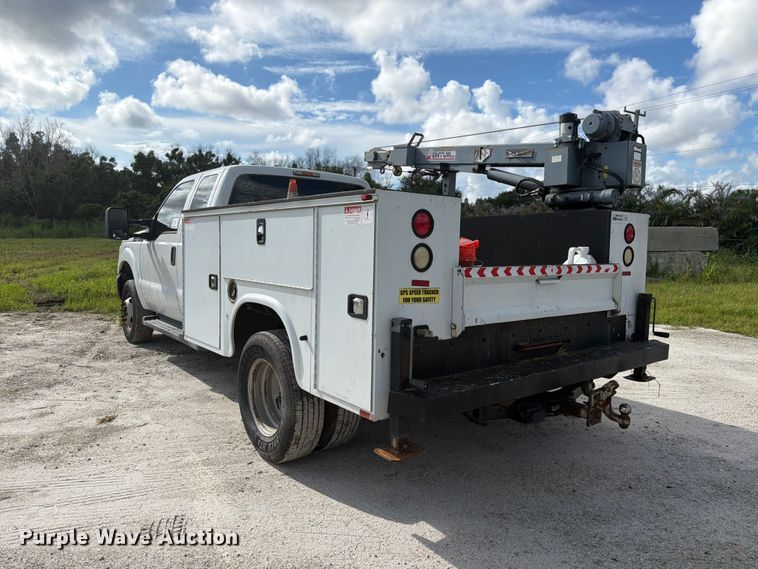 image for item DV7333 2015 Ford F350 Super Duty Ext. Cab utility bed pickup truck