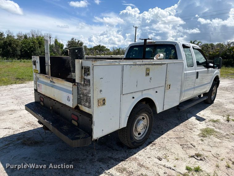 image for item DV7338 2015 Ford F250 Super Duty Ext. Cab utility bed pickup truck