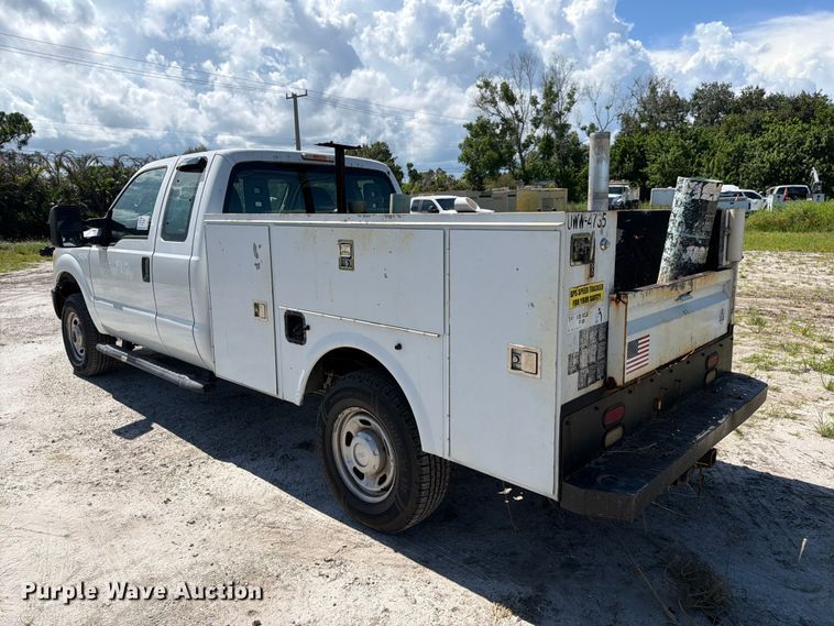image for item DV7338 2015 Ford F250 Super Duty Ext. Cab utility bed pickup truck