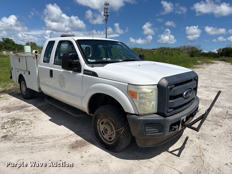 image for item DV7339 2015 Ford F250 Super Duty Ext. Cab utility bed pickup truck