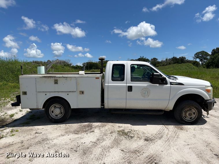 image for item DV7339 2015 Ford F250 Super Duty Ext. Cab utility bed pickup truck