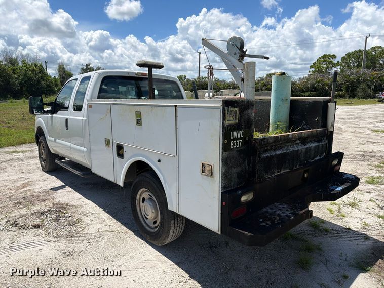 image for item DV7339 2015 Ford F250 Super Duty Ext. Cab utility bed pickup truck