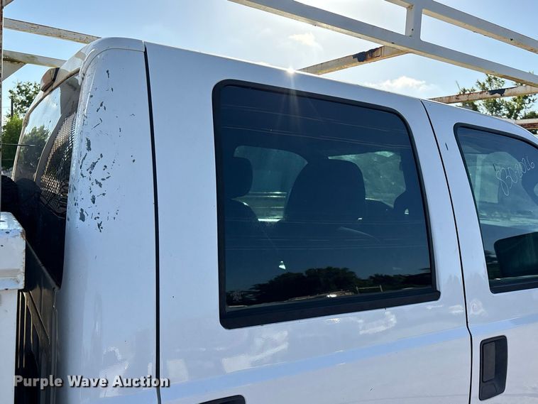 image for item EU0836 2014 Ford F250 Super Duty Crew Cab utility bed pickup truck