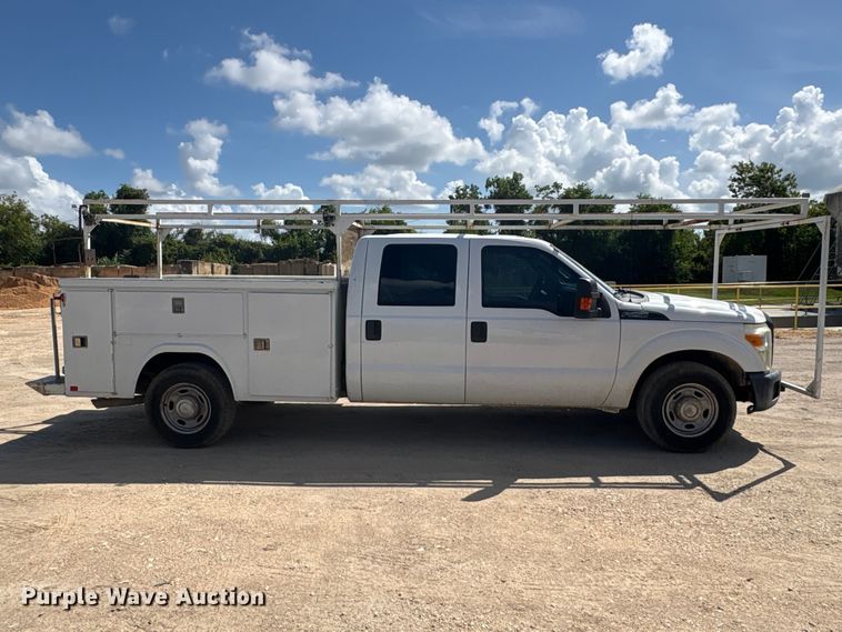 image for item EU0841 2014 Ford F250 Super Duty Crew Cab utility bed pickup truck