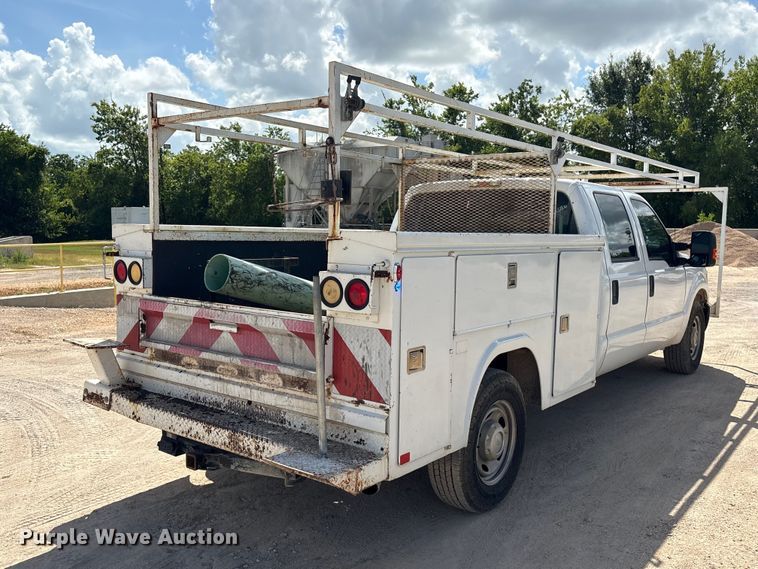 image for item EU0841 2014 Ford F250 Super Duty Crew Cab utility bed pickup truck
