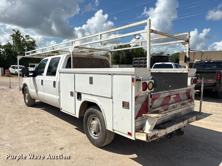 image for item EU0841 2014 Ford F250 Super Duty Crew Cab utility bed pickup truck