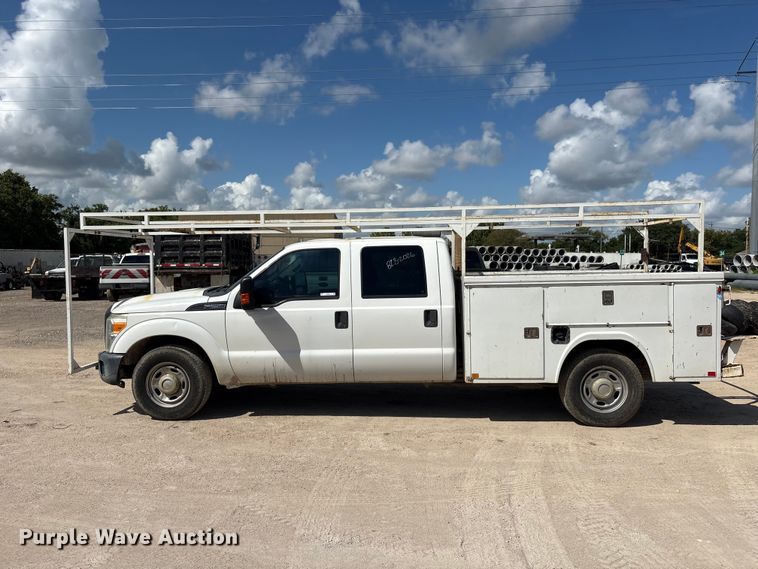 image for item EU0841 2014 Ford F250 Super Duty Crew Cab utility bed pickup truck